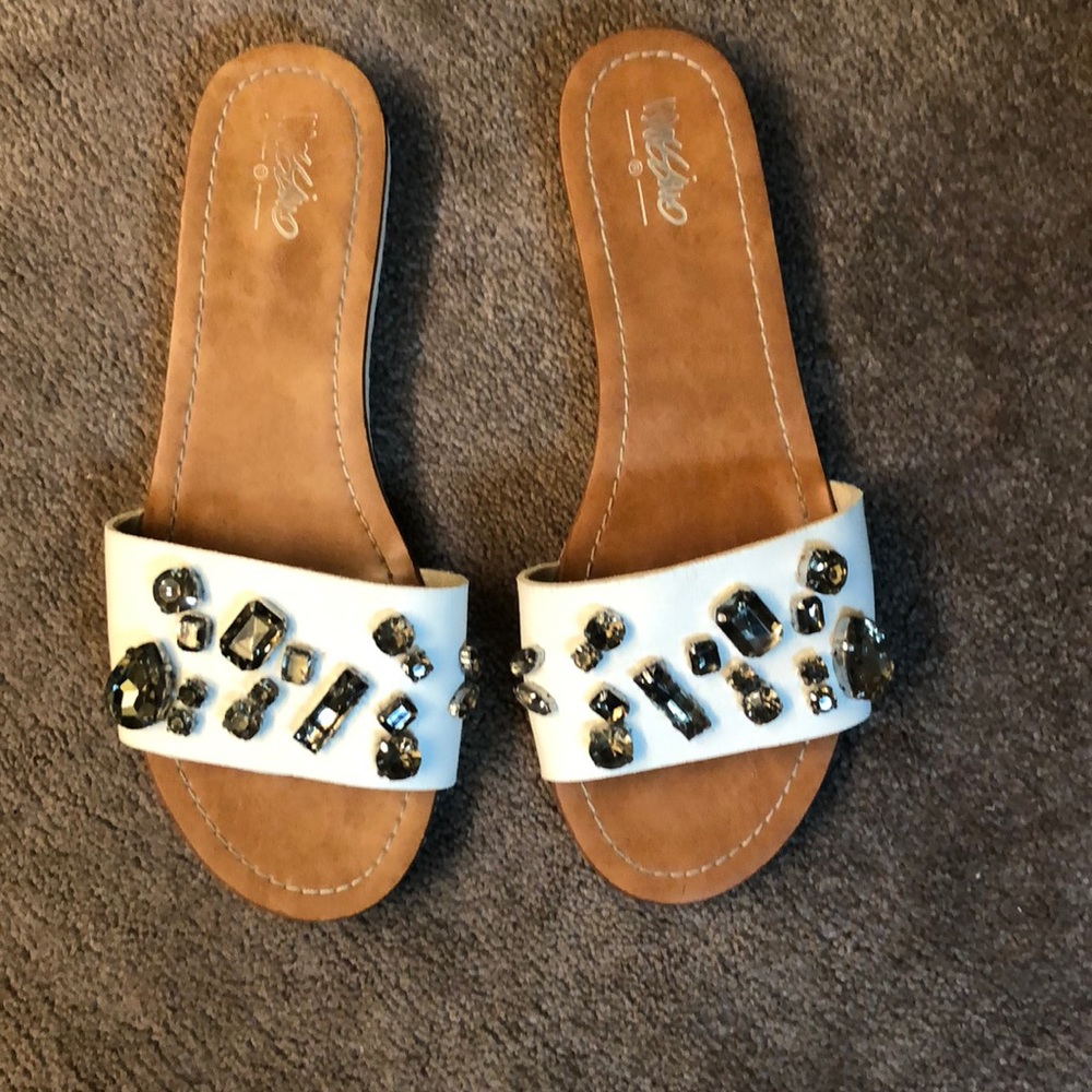 White bedazzled leather slide .